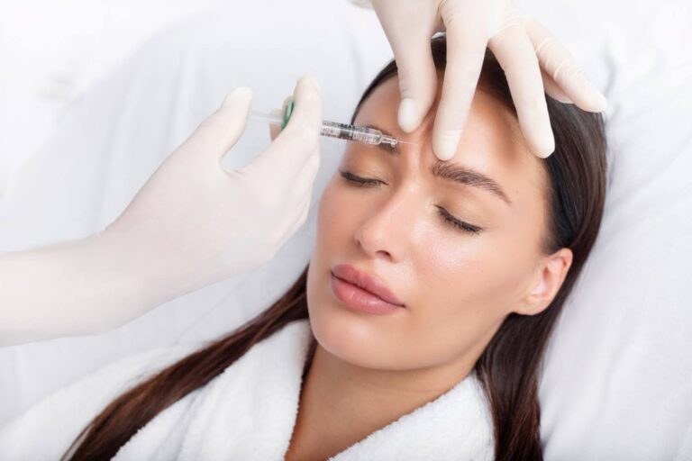 young woman at clinic getting Getting Neurotoxin Treatments