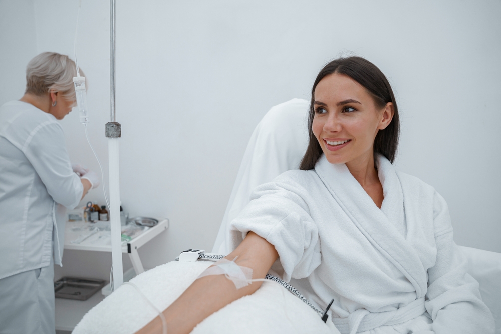 Beautiful,Woman,In,White,Bathrobe,During,Medical,Procedure,In,Beauty