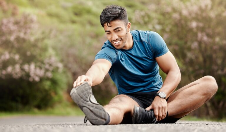 Outdoor,,Man,And,Stretching,Leg,For,Fitness,,Training,And,Exercise