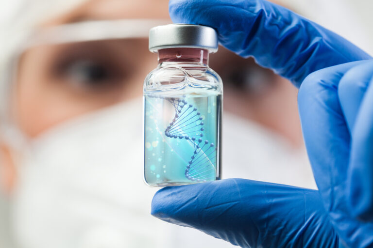 Uk,Lab,Scientist,Biotechnologist,Holding,Glass,Ampoule,Phial,With,Dna