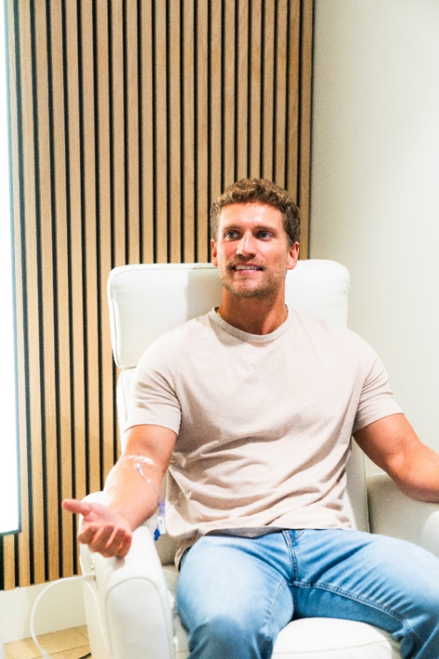 man in IV suite getting peptide therapy at relive Coral Gables