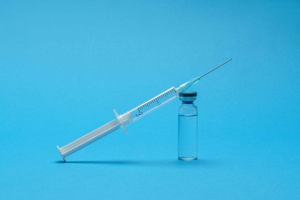 Syringe and medication vial for a vitamin booster shot